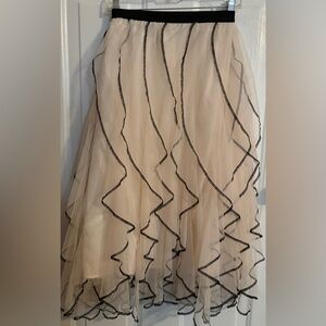 Elegant Cream and Black Ruffled Skirt